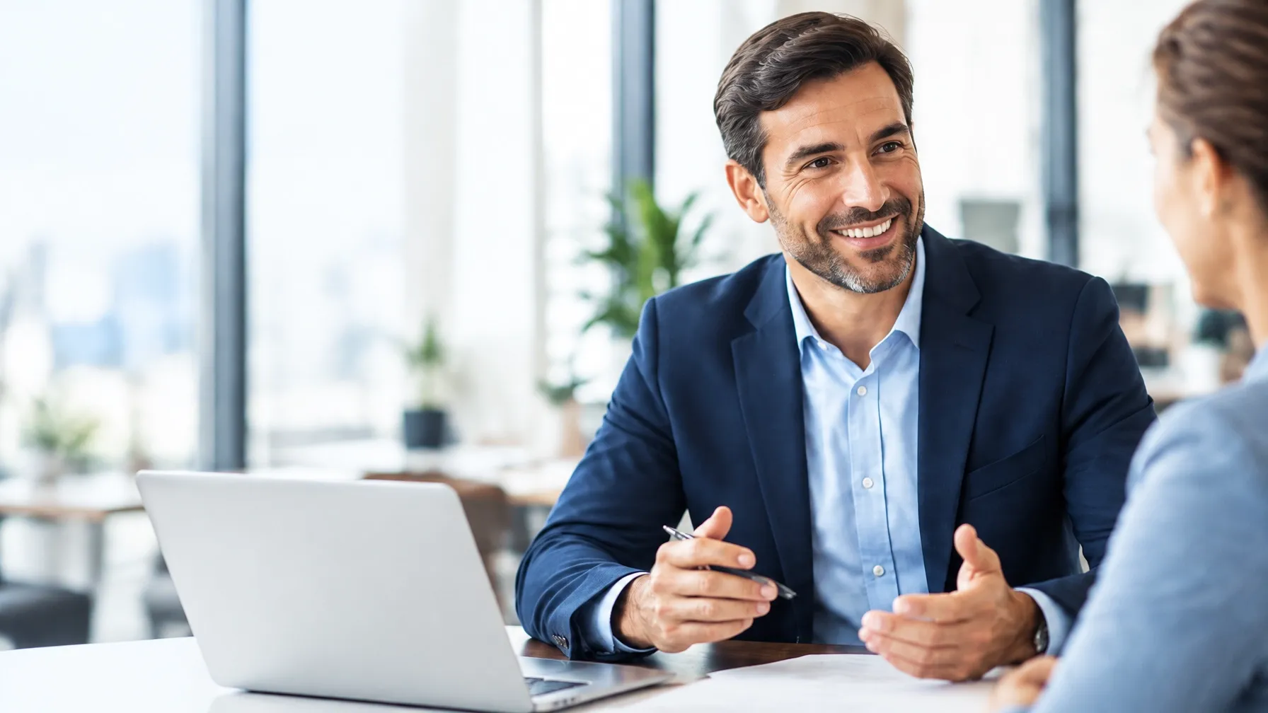 A franchise advisor discussing business ownership with a prospective entrepreneur